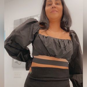 Black crop top with cut out at bottom